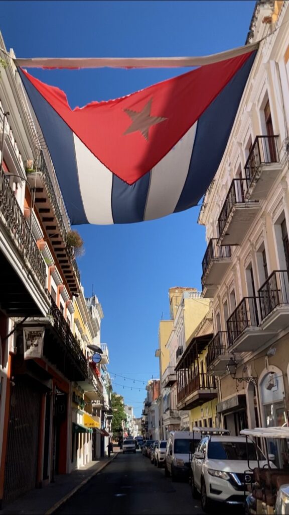 Streets of Old San Juan with flag, San Juan, PR