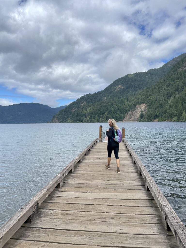 Nikki at the shoreline of Lake Crescent