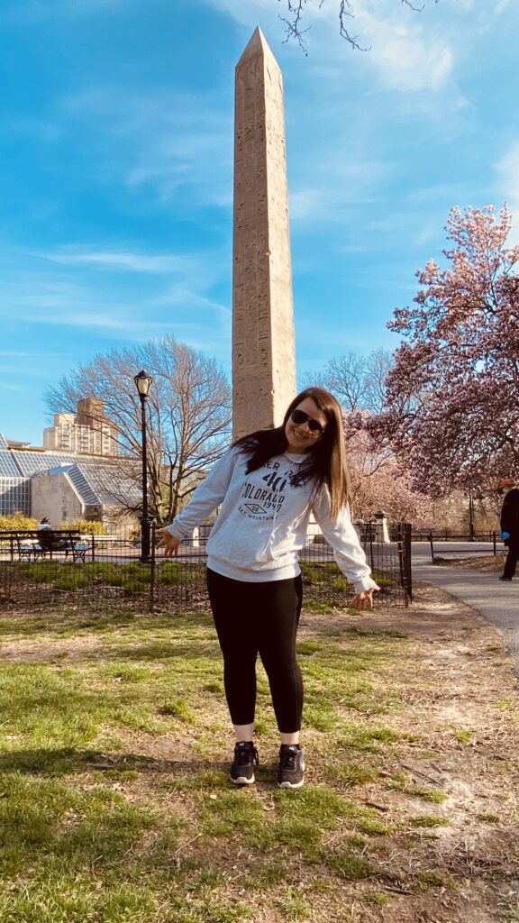 Woman Poses at Cleopatra's Needle