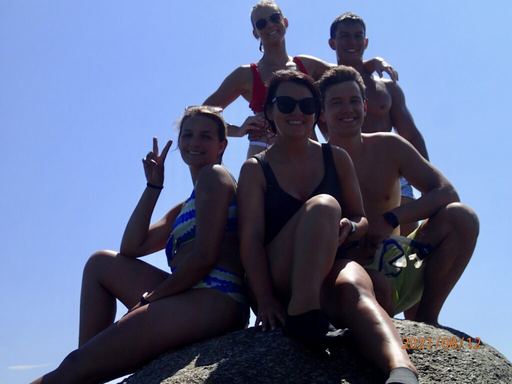 Group shot on the rock at Paraga Beach