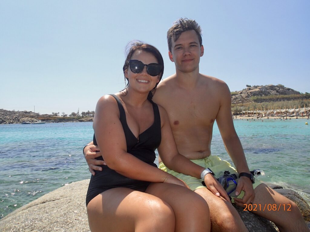 Ethan and Emily swim to a rock in the Aegean