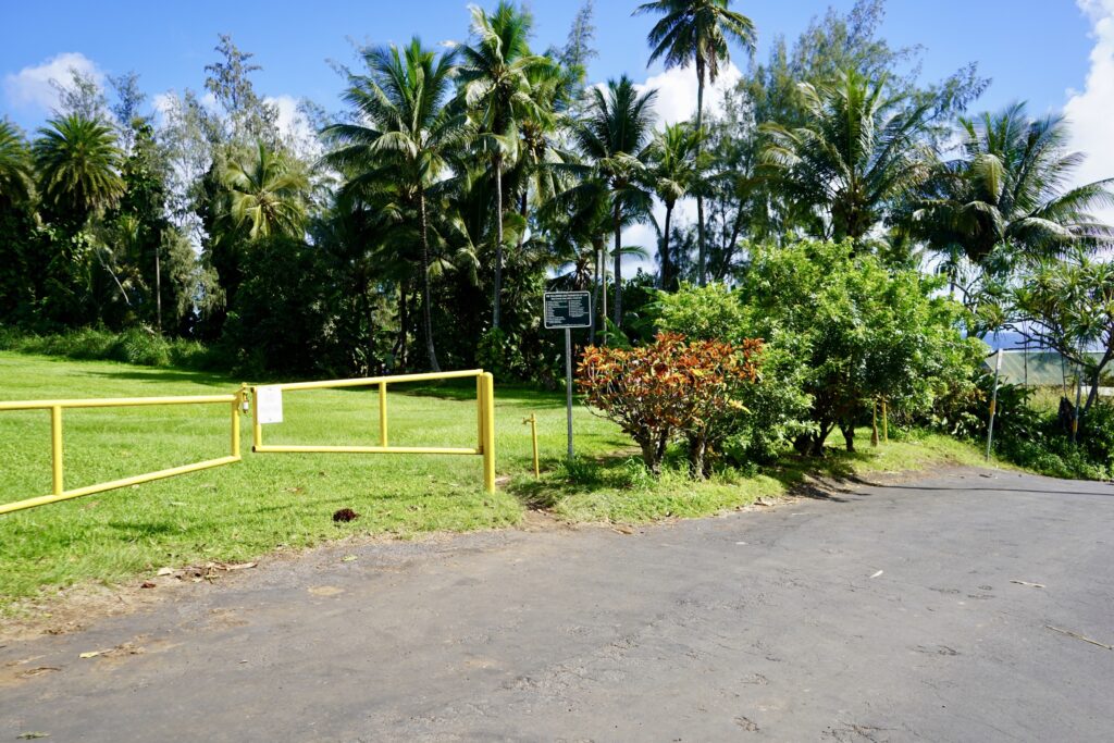 Turn left at this gate and sign off Uakea Road to access trail to red sand beach