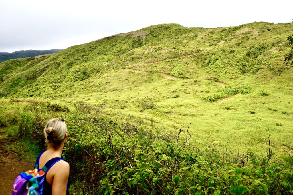 Nikki approaching some switchbacks before starting the ridge hiking