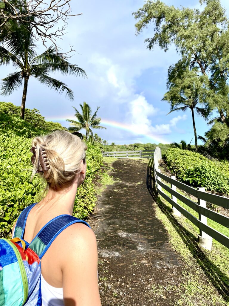 King's Trail with rainbow at black sand beach