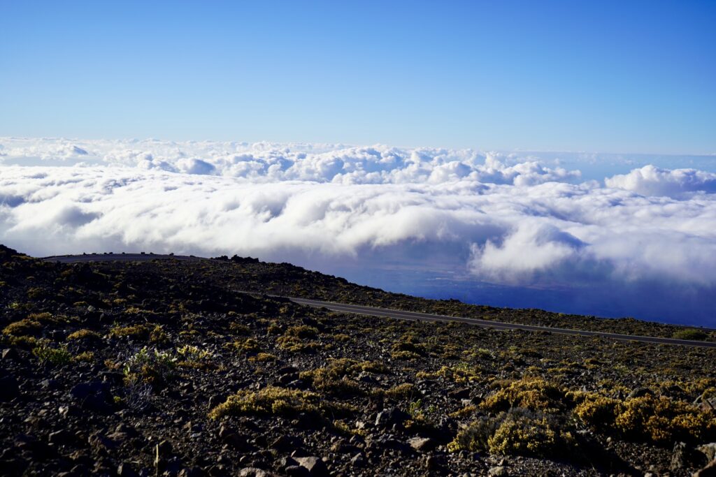 Arid land above the cloud line on road to Haleakala