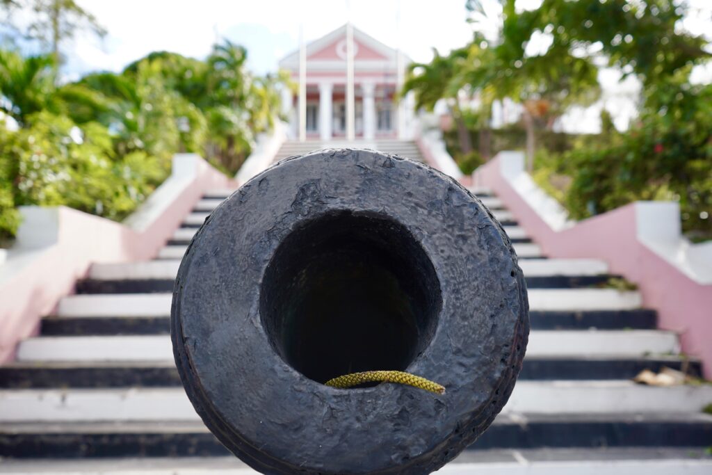 Looking down the barrel of a cannon in front of the Governor's Mansion