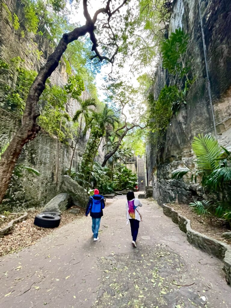 Mom and Guide Patrick wall towards the Queen's Staircase