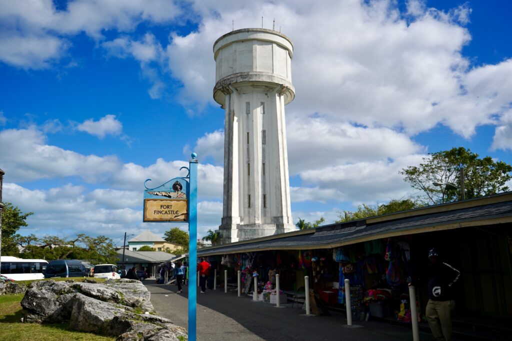 Small souvenir stands next to Fort Fincastle with Water Tower behind