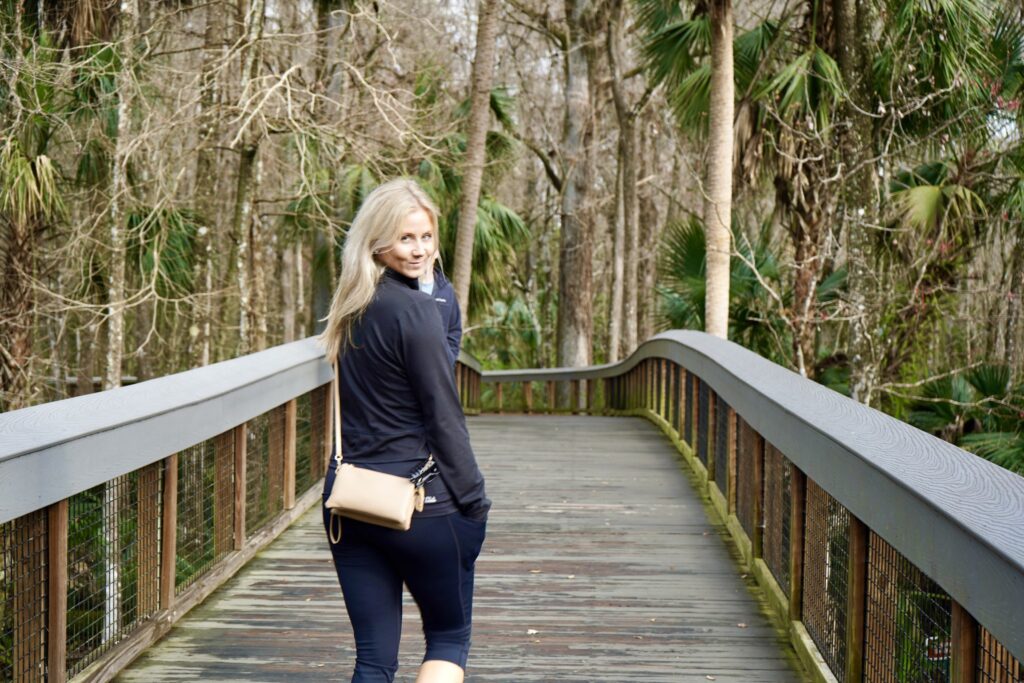 Nikki walking along boardwalk (where the monkeys are sometimes seen)