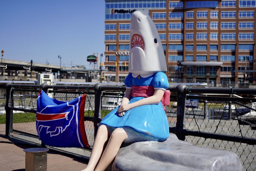 Taking a picture with the iconic "Shark Girl" statue at Canalside is a classic free Buffalo activity