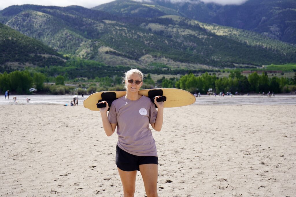 Nikki after crossing Medano Creek ready to Sandboard