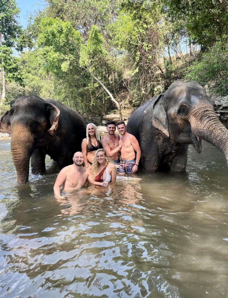 Jackie and friends bathing the elephants at Chai Lai Orchid