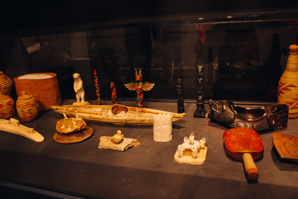 Artifacts within a glass case.