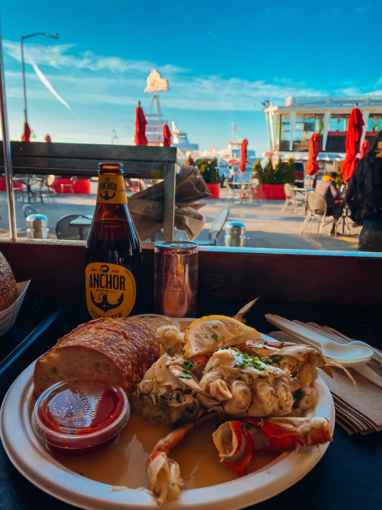 Crab and a beer in a window