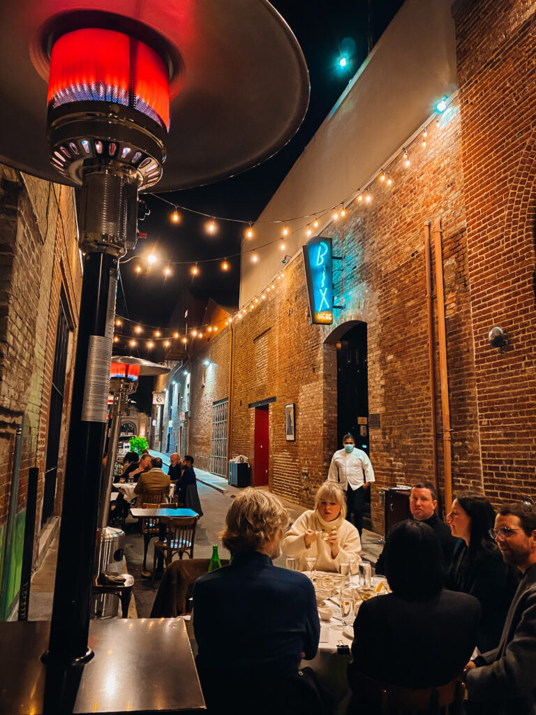 Alleyway with tables.