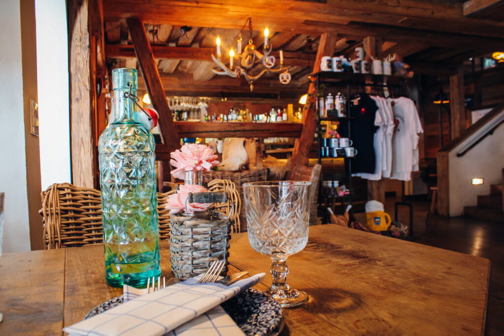 Decorative interior with crystal bottle and water holder.